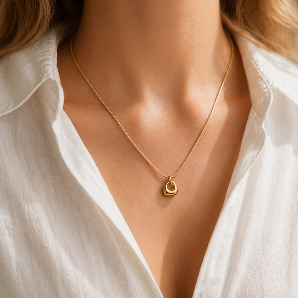 Solace pendant necklace in gold PVD plated stainless steel on snake chain