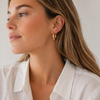 Chunky contour hoop earrings in gold and silver with a smooth polished finish