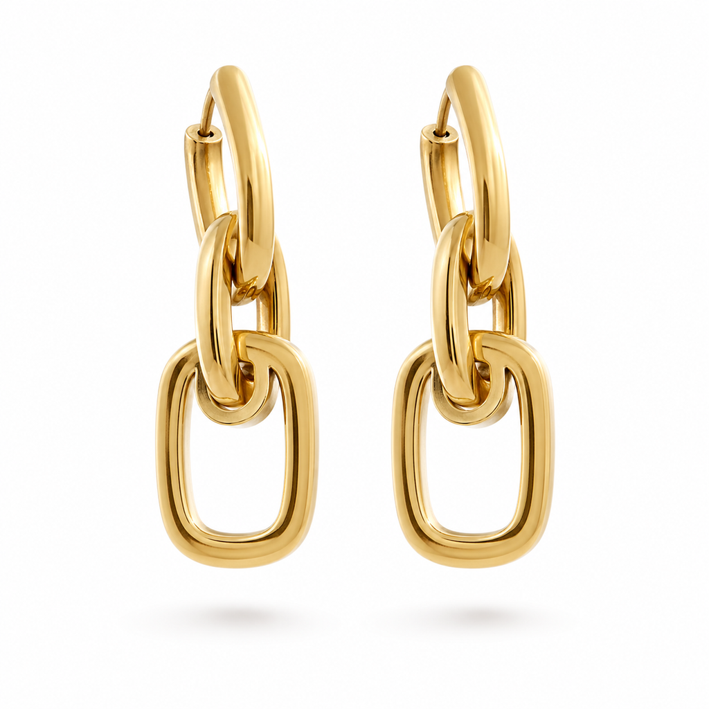 Gold and silver chain-link drop earrings with polished finish and huggie hoop closure on white background.