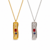 Textured bar pendant necklace with mixed stones in gold and silver finishes on a fine chain, modern coastal-inspired jewellery.