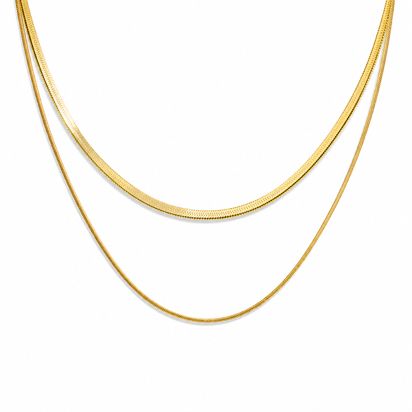 Gold layered necklace featuring a flat snake chain and fine chain creating a minimal stacked jewellery look