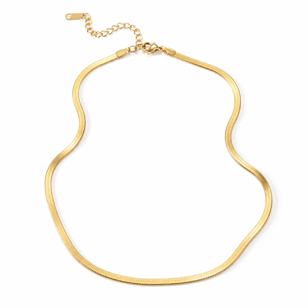 Gold flat 3mm chain necklace worn on neck with smooth reflective finish, minimal modern jewellery style