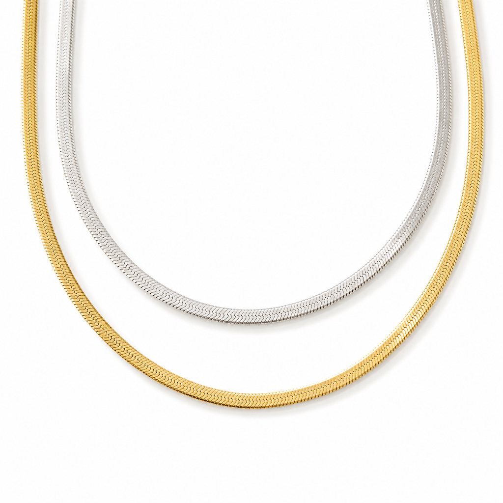 Gold flat 3mm chain necklace worn on neck with smooth reflective finish, minimal modern jewellery style