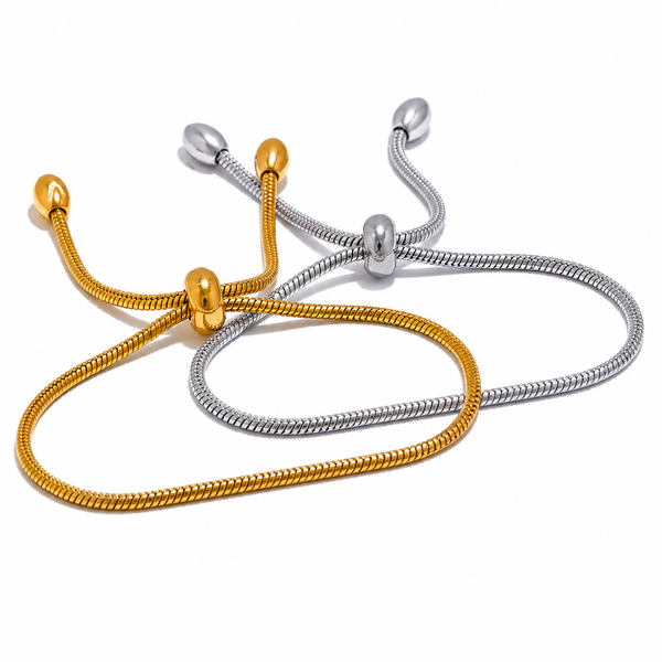 Adjustable snake chain bracelet with sliding clasp in gold and silver stainless steel on white background