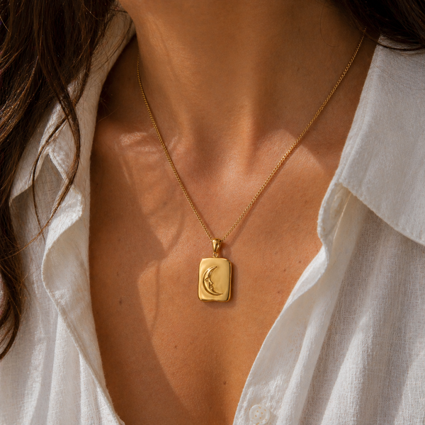 Reversible sun and moon pendant necklace in gold and silver, waterproof stainless steel jewellery