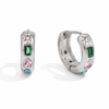 Gold and silver huggie earrings with colourful gemstone settings including green, pink, and blue stones with a star detail.