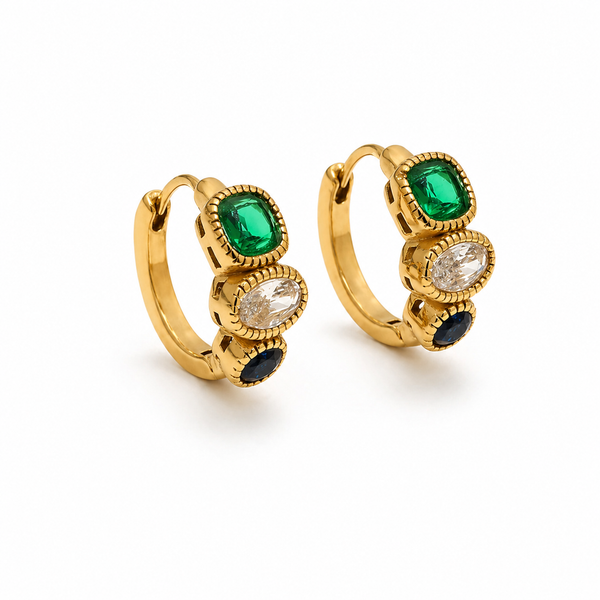 Gold huggie earrings with three stacked stones in green, clear and navy, textured bezel settings, minimal white background